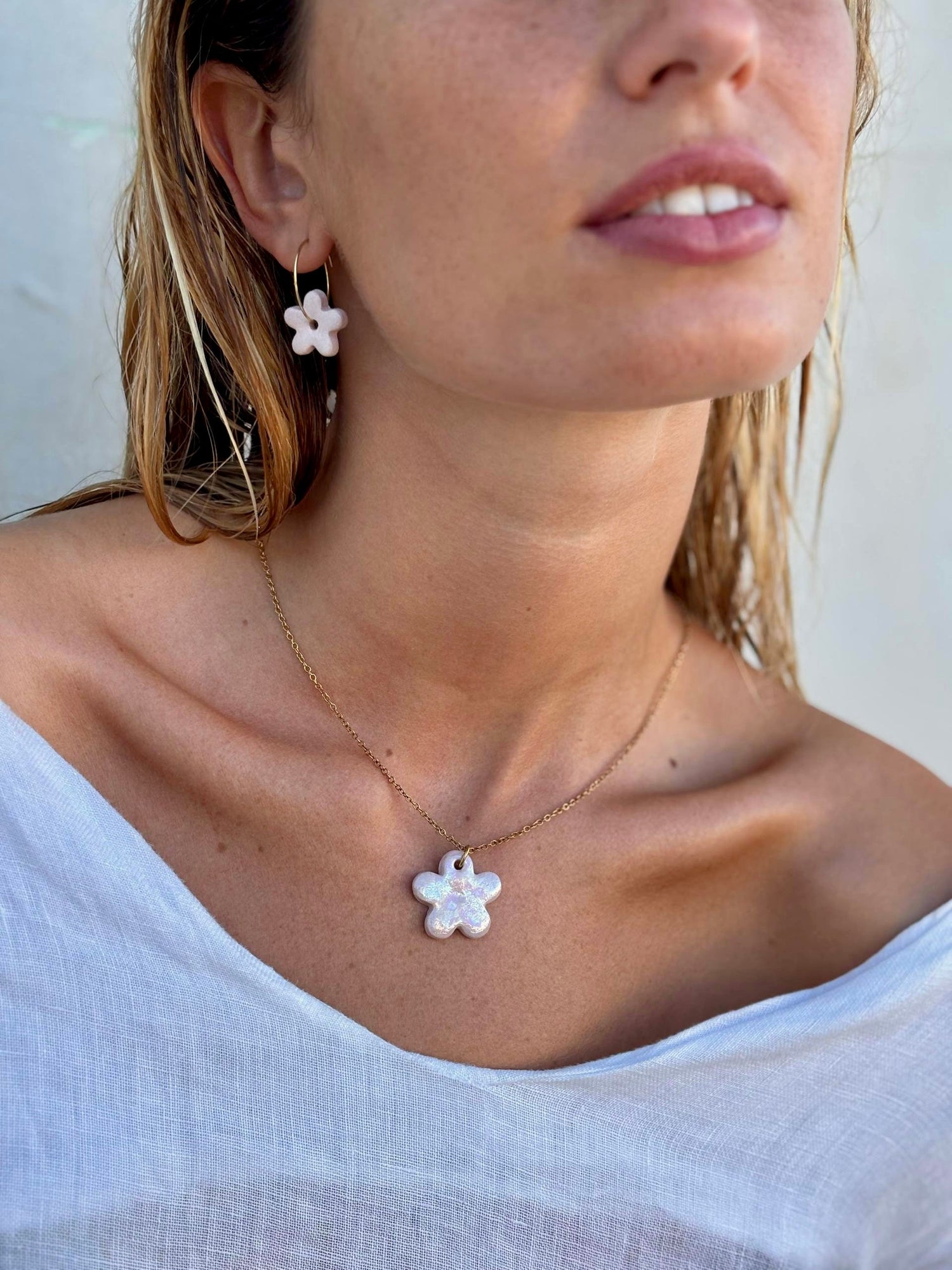 Collection of ceramic necklaces, rings, and earrings handcrafted in Italy by Agnese Ban
