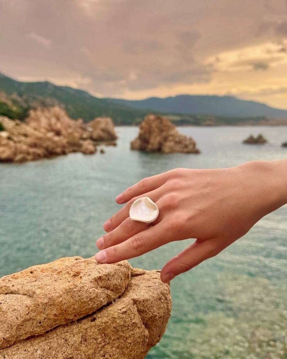 Unique artisan ceramic ring with pearly luster or golden details