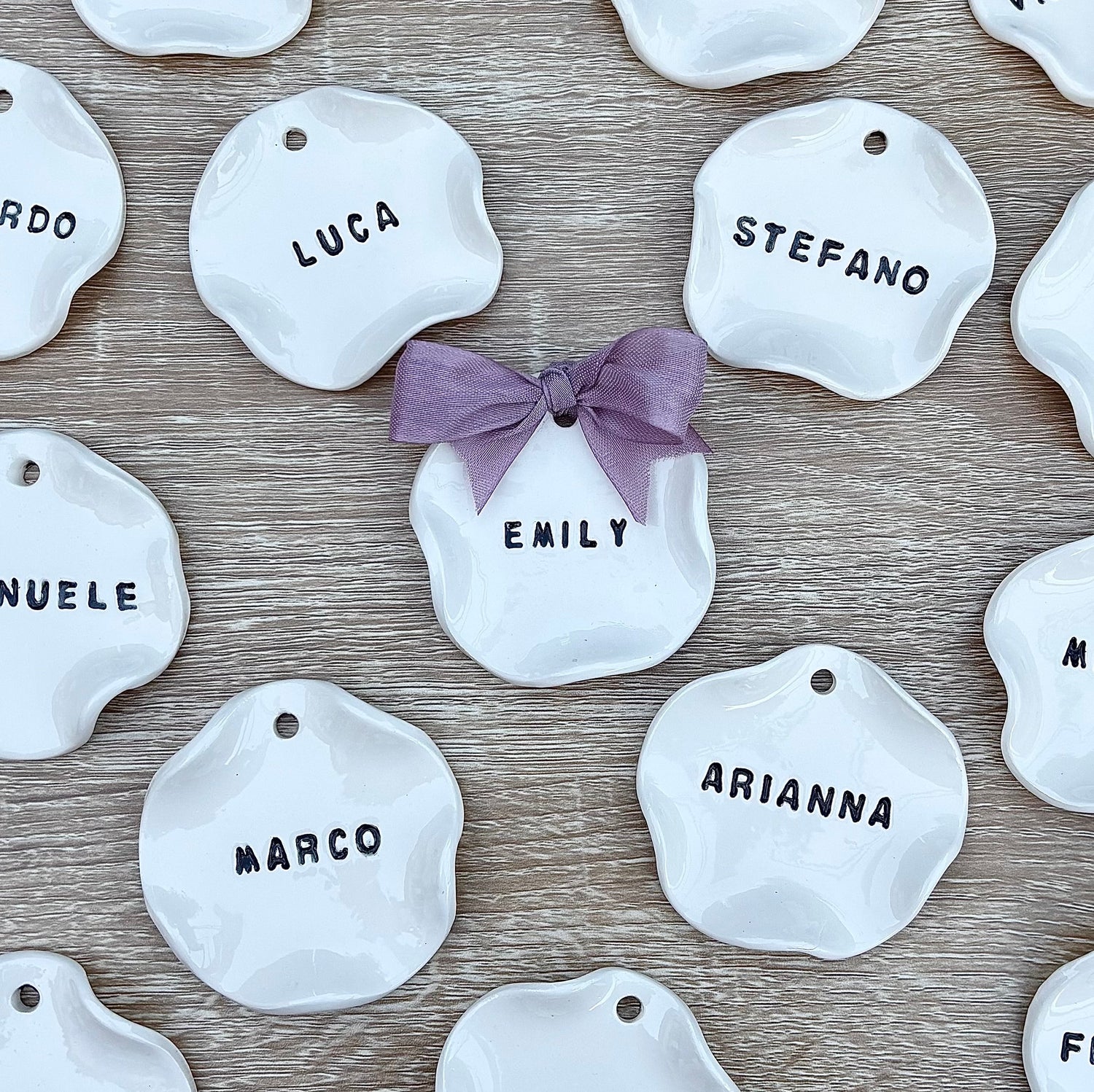Handmade customized ceramic place card with guest name