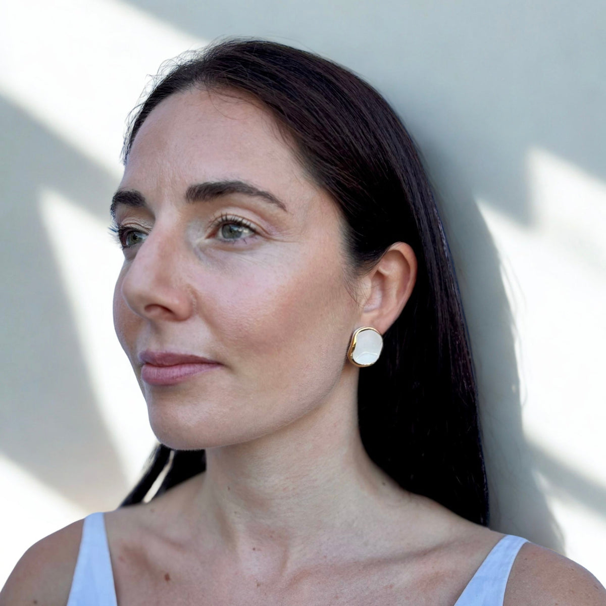 Leda | Handcrafted white ceramic stud earrings with gold luster White and gold Small banceramiche